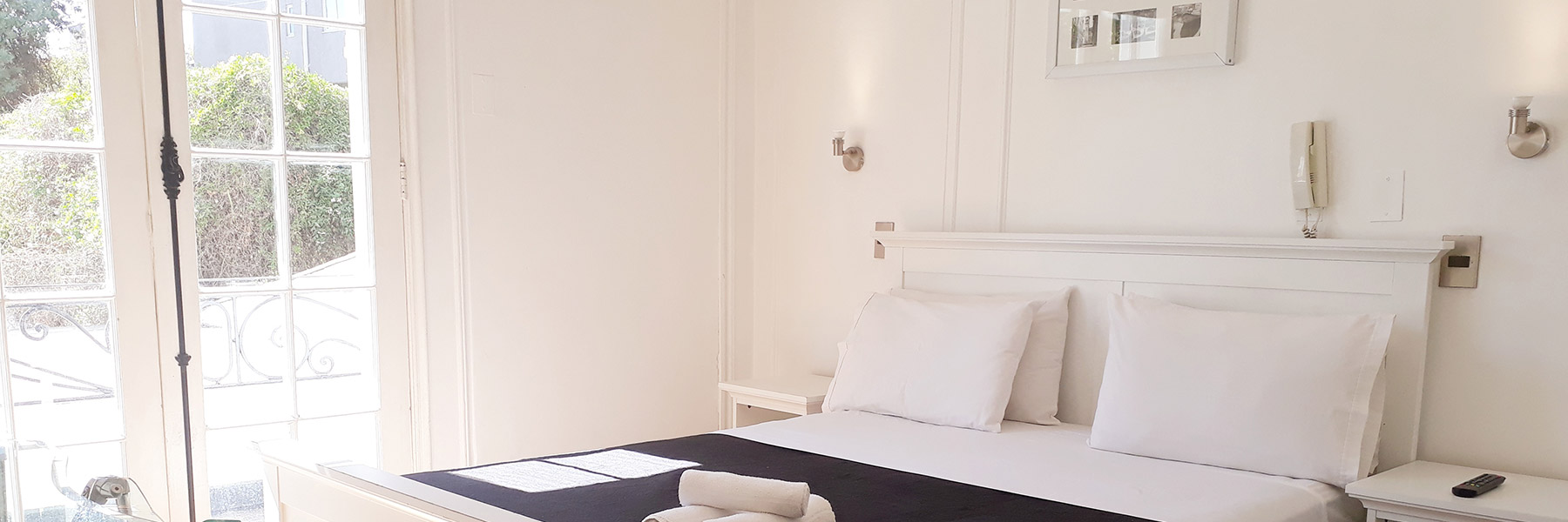 Habitaciones del Hotel Boutique Tremo Patio Bellavista en Santiago de